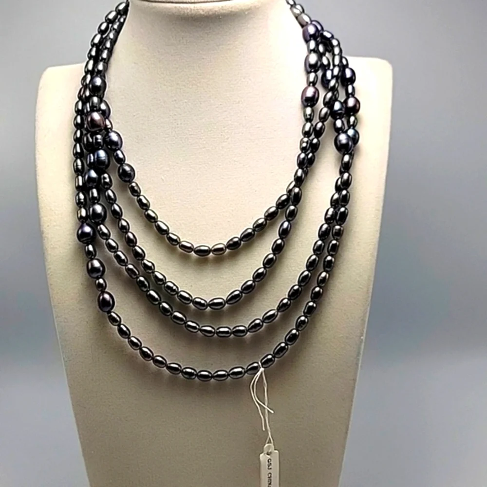 Lustrous Black Charcoal Fresh Water Peacock Pearl 66